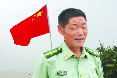 　　王继才生前照片 吴晨光摄 光明图片/视觉中国